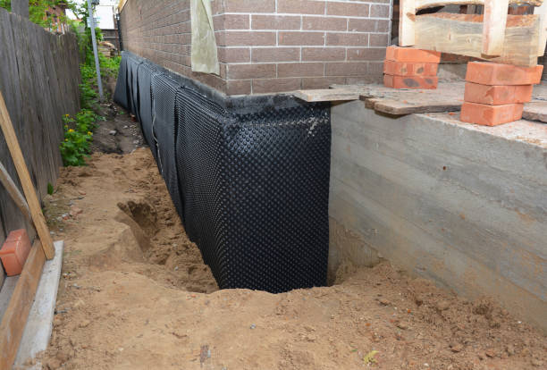 Happy homeowners after waterproofing job in Denmark